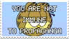 'you are not immune to propoganda' stamp written over garfield's face