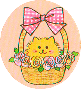 smiling yellow cat sitting in a wicker basket of flowers with a checked ribbon on the handle